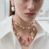Gold Shell And Pearl Necklace
